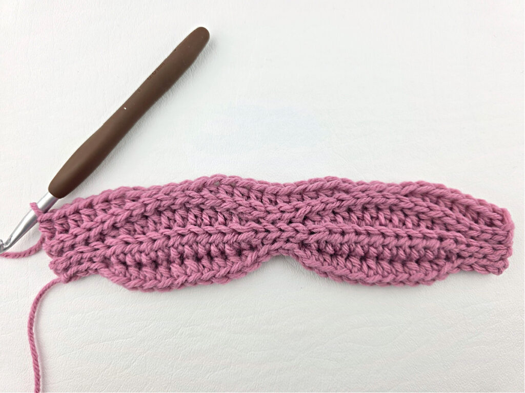 Creating a crochet wave stitch swatch.