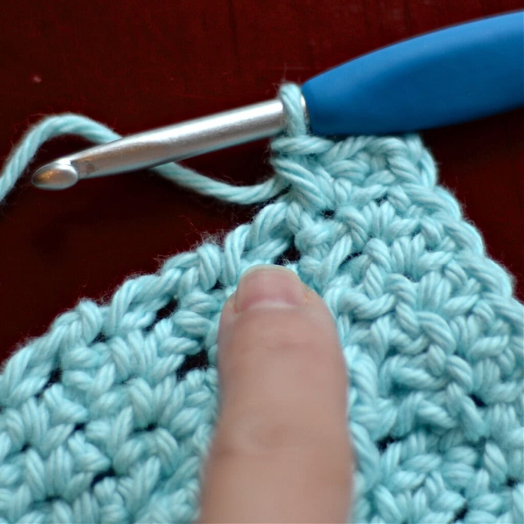 Making the border of a crochet blanket.