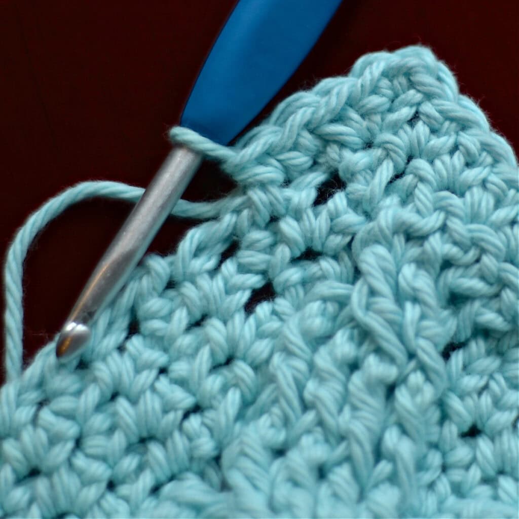 Making the border of a crochet blanket.