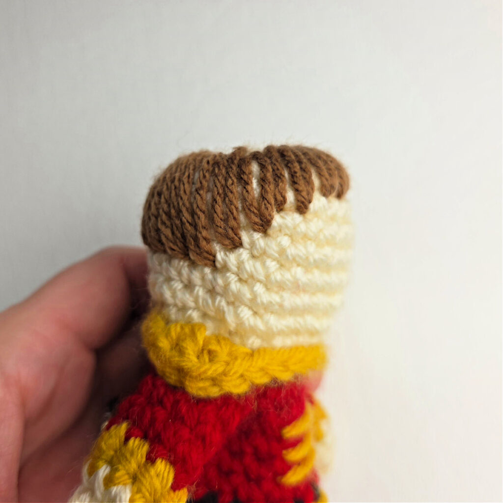 A completed side view of the nutcracker's hair.