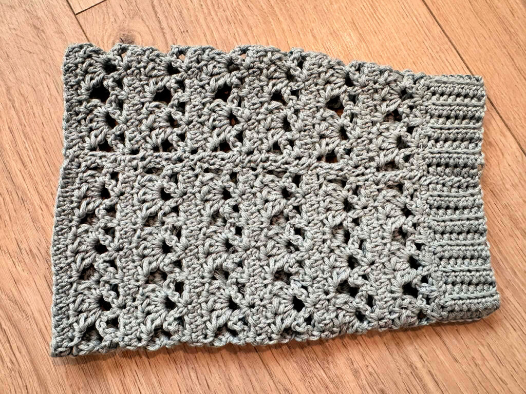 Making a blue summer crochet cardigan.